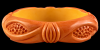 heavily patinaed butterscotch bow carved bangle